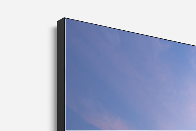 Diamond Beach Bali dans un cadre aluminium affleurant noir detail de coin gauche